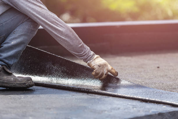 Professional Emergency Waterproofing technician working in Long Beach, MD